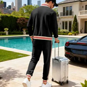 Men's heavyweight black fleece tracksuit two-piece set with striped details on back view