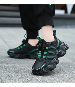 Close-up of kids' waterproof leather sports shoes with a rotating lace buckle system