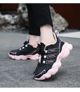 Children's leather sports sneakers featuring a pink wavy sole and easy rotating dial buckle