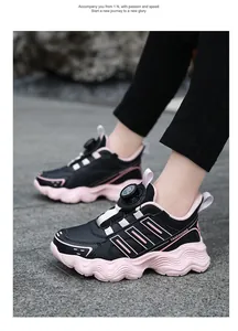 Stylish children's sports sneakers featuring a rotary dial buckle and a pink wavy chunky sole