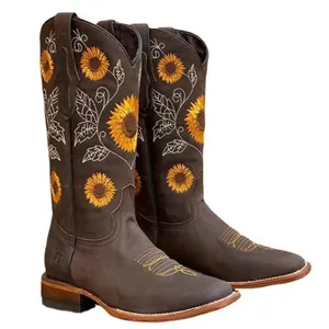 Vintage brown leather cowboy boots for women featuring vibrant sunflower embroidery