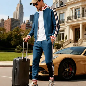 Men's heavy fleece teal tracksuit set styled with a golden luxury sports car outdoors