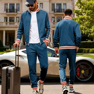 Back and front view of men's blue fleece tracksuit with striped trim detail