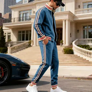 Men's blue heavyweight fleece tracksuit two-piece set with athletic side stripe detailing