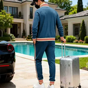 Men's navy blue two-piece heavy fleece tracksuit with striped trim detailing