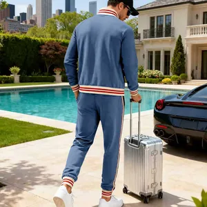Men's blue heavyweight fleece tracksuit set with red-white striped ribbed cuffs back view