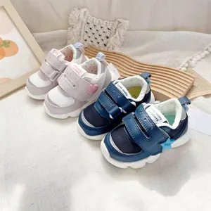 Two pairs of breathable mesh baby walking shoes with adjustable straps in pink and navy