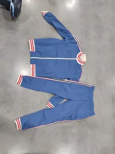 Heavyweight blue fleece two-piece tracksuit for men with striped ribbing details.