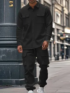 Full street style view of heavy fleece-lined men's black cargo tracksuit and jacket set