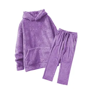 Detailed view of cozy men's purple coral fleece leisure hoodie and pants loungewear set