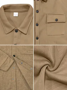 Detail view of khaki work jacket collar, snap buttons, and ribbed fabric texture.
