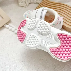 Close-up of anti-slip rubber sole on lightweight baby walking shoes