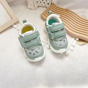 Top view of lightweight mint green baby walking shoes featuring soft soles and hook-and-loop straps