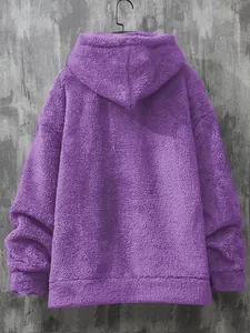Close-up back view of a purple oversized hooded sweatshirt made of soft coral fleece.