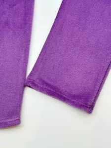 Macro detail of soft purple coral fleece fabric for men's winter warm tracksuit set