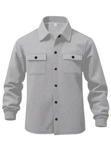 Detail view of grey heavyweight men's fleece work shirt jacket with chest pockets
