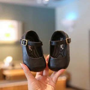Chaussures en cuir Mary Jane noires pour fillettes avec semelles souples et brides boucle