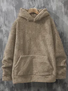 Detail view of a men's plush coral fleece hoodie in khaki with kangaroo pocket.