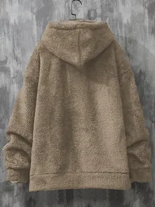 Back view of men's oversized brown fuzzy hoodie made of warm coral fleece