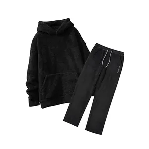 Detail showing the plush texture of this men's black coral fleece hoodie and pants set.