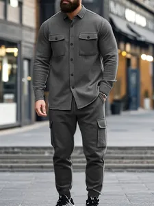 Detailed view of men's heavy fleece workwear set in dark grey urban lifestyle style
