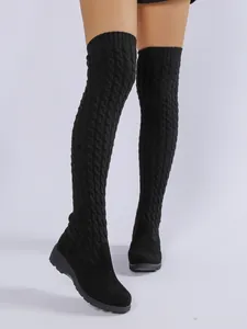 Elegantes botas mosqueteras de punto negro con cuña gruesa y ajuste adelgazante