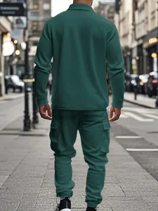 Rear view detail of a heavy dark green men's cargo tracksuit with outdoor street vibe.