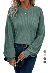 Detailed view of women's sage green ribbed knit long sleeve T-shirt with crew neck
