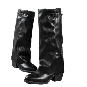 Stylish black pointed-toe pant-leg boots with chunky heel and metal buckle details