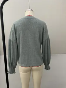 Back view of a casual grey ribbed long sleeve T-shirt with stylish balloon sleeves for women
