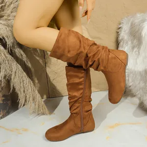 Stylish women's mid-calf slouchy boots in brown faux suede with a side zipper