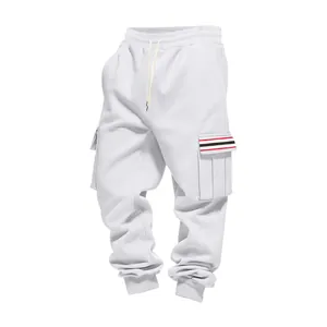 Men's white fleece cargo sweatpants with multi-pockets and striped accent detail.