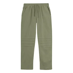 Pantaloni casual in lino verde oliva da uomo con eleganti dettagli sulle ginocchia a pieghe