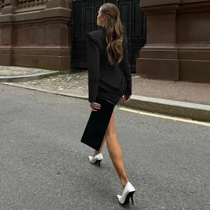 Back view of elegant black blazer dress with draped detailing for women's fashion.