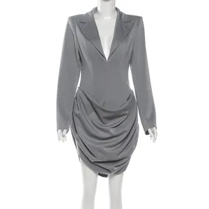 Elegant grey deep V-neck blazer dress featuring sophisticated draped skirt details