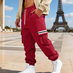 Stylish red fleece cargo joggers for men with striped pocket detail and drawstring