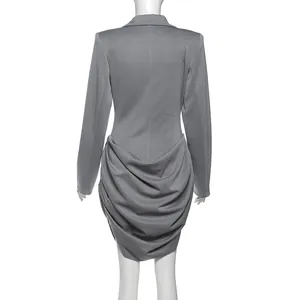Elegant gray slim fit long sleeve blazer dress with a unique draped back detail.
