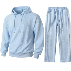 Men's light blue jacquard hooded sweatshirt and pants set with cable knit texture.