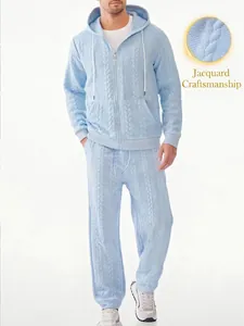 Detail view of the cable knit jacquard pattern on a men's light blue hoodie set
