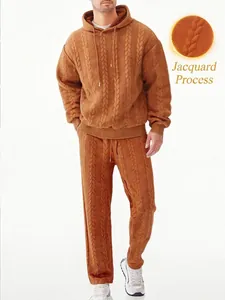 Close-up of men's cable knit hoodie set showing the textured jacquard fabric detail.