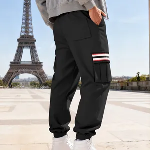 Detailed rear view of black fleece cargo sweatpants featuring a striped side pocket flap