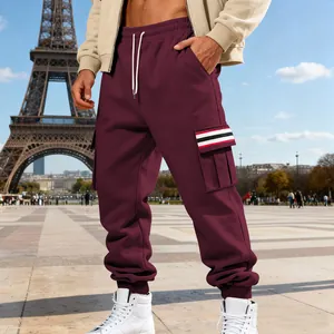 Men's maroon fleece cargo joggers featuring multi-pockets and striped accent detail