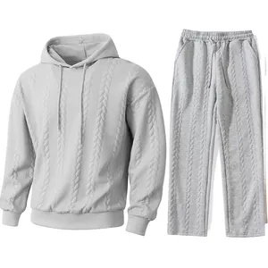 Detail of men's gray jacquard hooded sweatshirt and matching sweatpants set