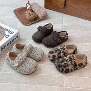 Cozy children's fleece button shoes available in brown, leopard print and cream speckled