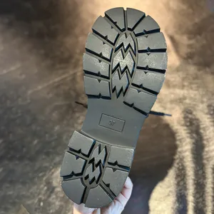 Detailed view of the anti-slip thick rubber sole on fashion Martin boots with size 37