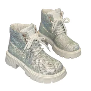 Sparkling iridescent rhinestone Martin boots with white laces and chunky soles