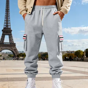 Men's grey fleece cargo pants with striped multi-pocket detail in casual street style