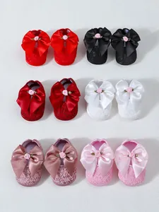 Detailed collection of infant princess shoes with large satin bows in six assorted colors