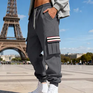 Side view of charcoal grey men's fleece cargo sweatpants with striped pocket detail