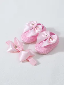 Pink baby shoes and headband set with lace and large satin bows for princess